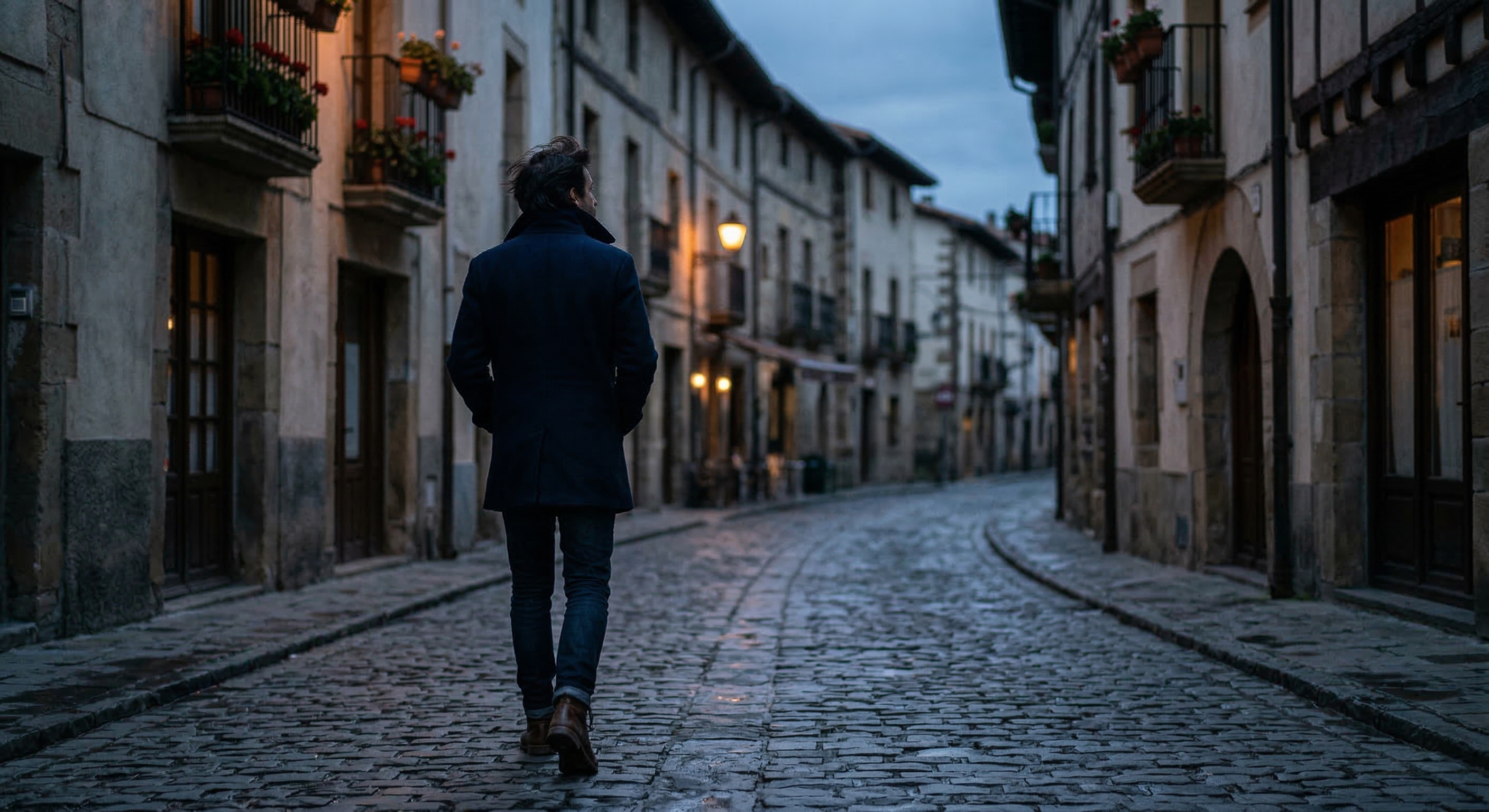 Person walking through unfamiliar European city reflecting on life abroad